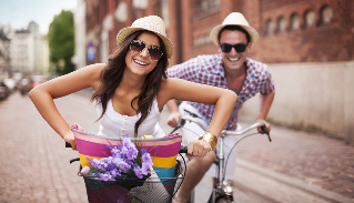 the woman with the man on the bike